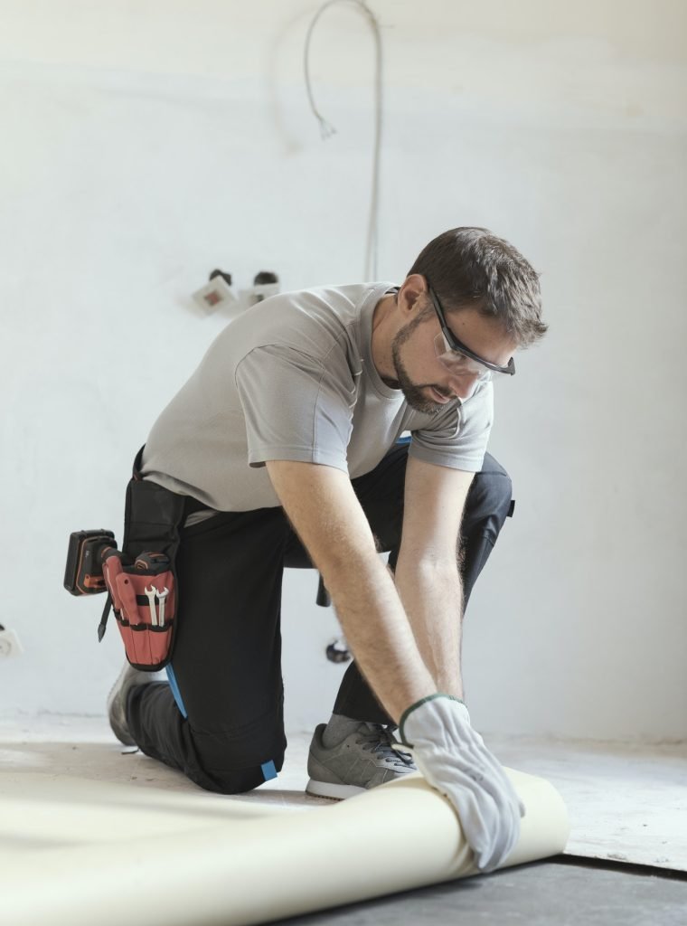 contractor-removing-an-old-linoleum-flooring.jpg contractor-removing-an-old-linoleum-flooring.jpg